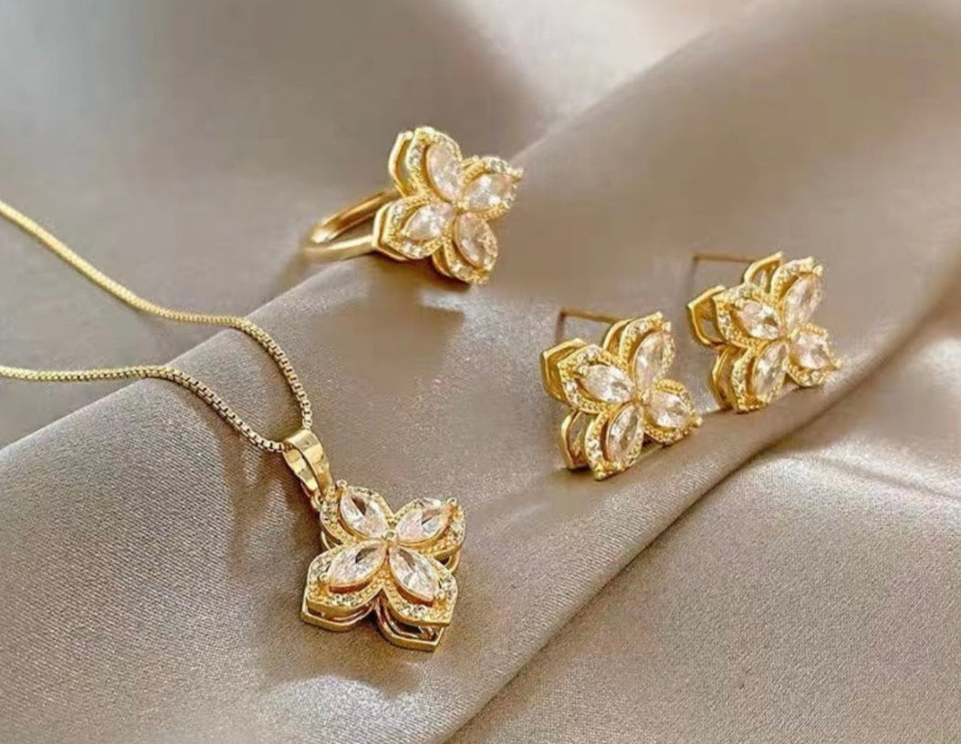 Rotating Clover Set-Necklace, Earrings, and Ring
